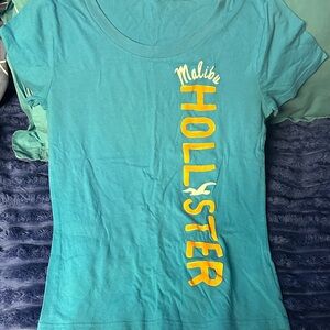 Hollister Blue T-Shirt with Yellow Graphic